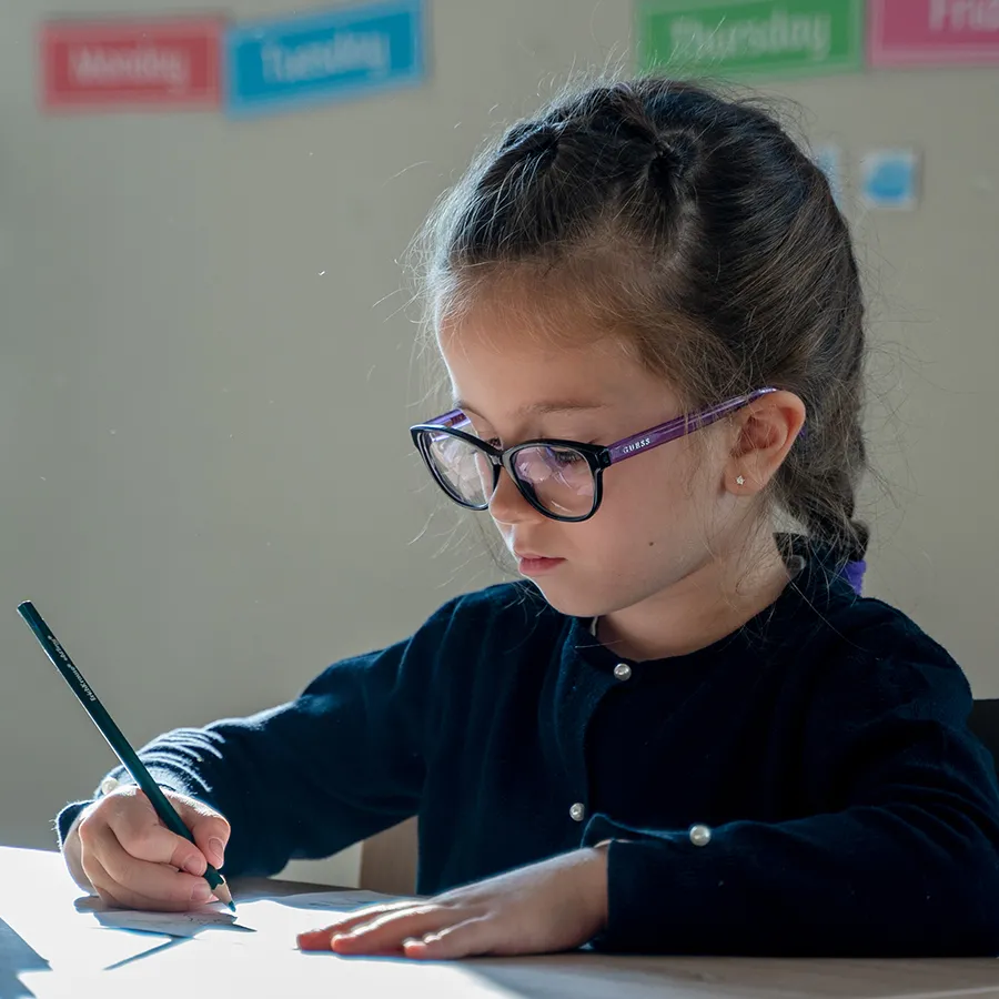 Child making a creative project